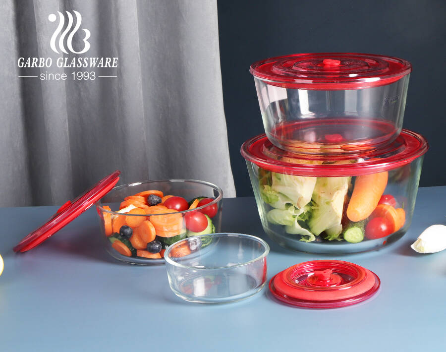 Contenitore per alimenti rotondo in vetro ad alto borosilicato resistente al calore di fabbrica con coperchio in plastica sigillato con foro per l'aria