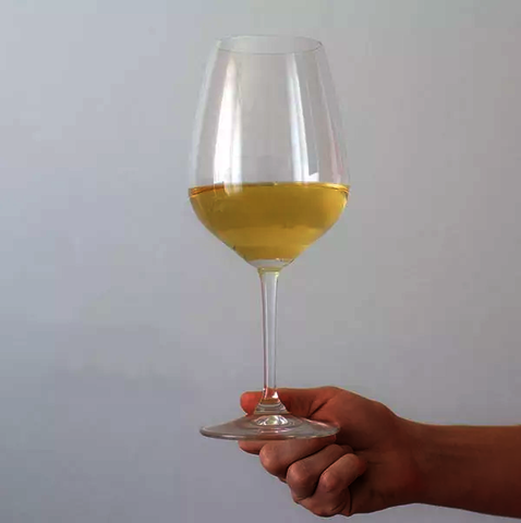 How to hold a wine glass correctly