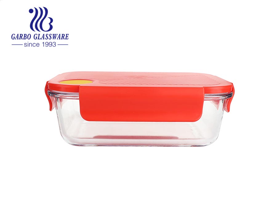 Fiambrera de vidrio para microondas popular Envase de comida de vidrio rectangular de 630 ml con tapas rojas para alimentos