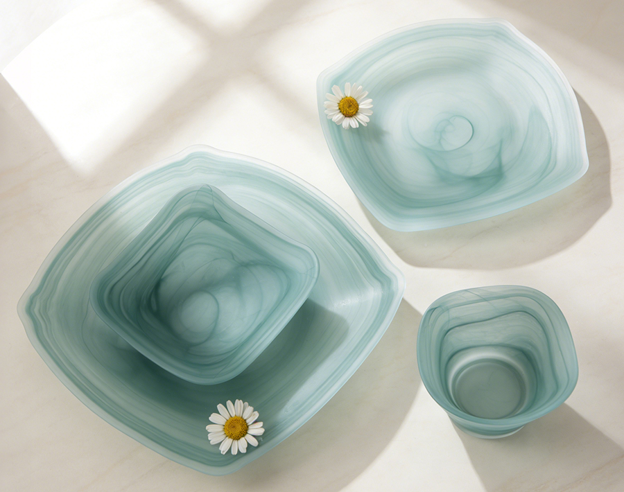 Colored glass bowls and plates showcase Chinese cultural style Colored glass bowls and plates showcase Chinese cultural style