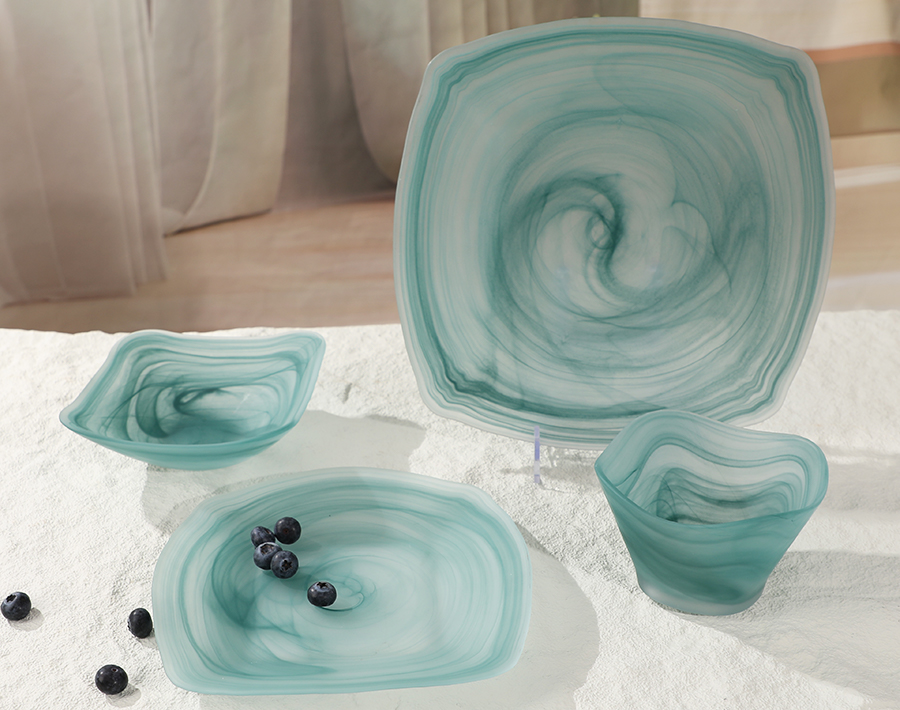 Colored glass bowls and plates showcase Chinese cultural style Colored glass bowls and plates showcase Chinese cultural style