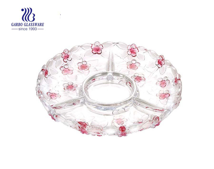 Assiette de fruits en verre rose avec motif rose