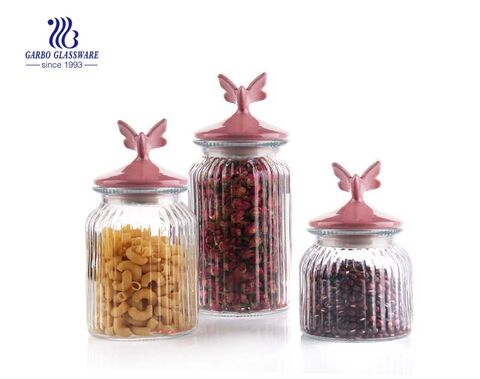  small glass candy storage jar with a gray lid 