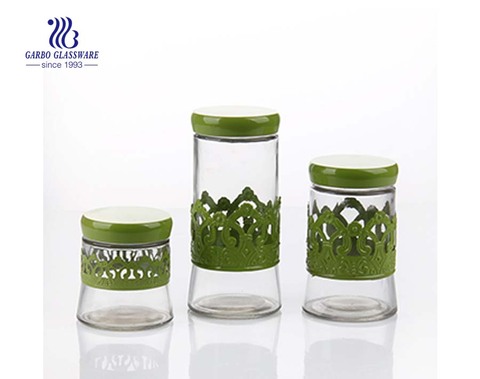 pretty glass storage jars with green decals