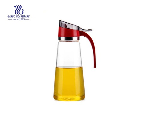 Bouteille d'huile en verre de pyrex de verrerie domestique utilisée quotidiennement de 550 ml