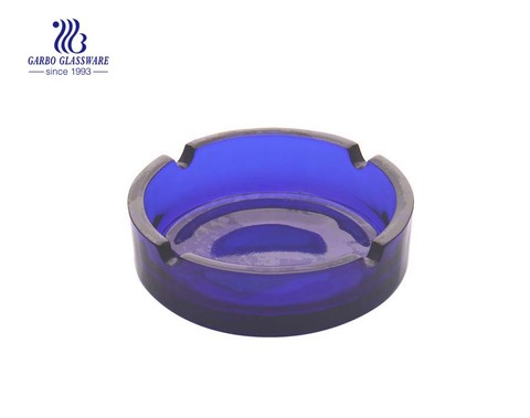 Glass ashtray solid blue color  in ashtray with custom design