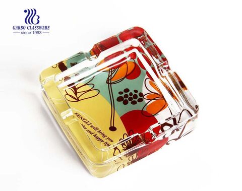 Amber color round glass ashtray for cigarette smoking 