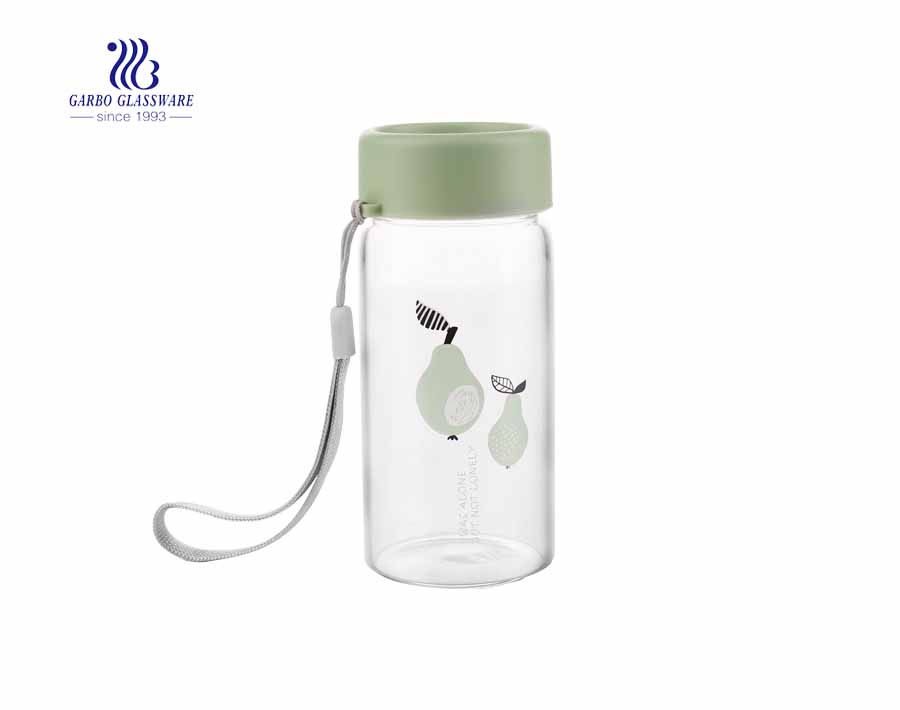 Daily use 260ml beverage clear glass drinking bottle with cover and string