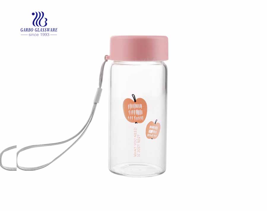 Daily use 260ml beverage clear glass drinking bottle with cover and string