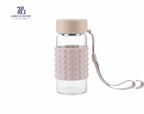 China hot sale 260ml borosilicate portable sport water glass bottle with silicone sleeve