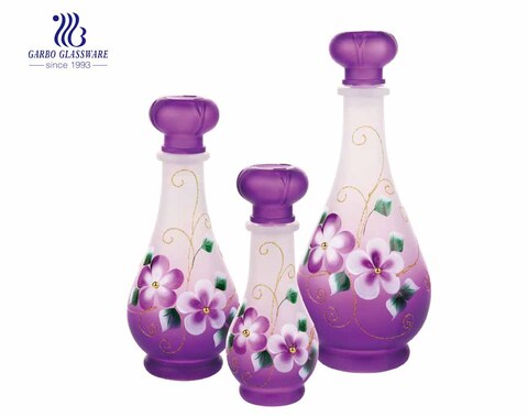 Wholesale cheap frosted colored and hand made painting 3pcs glass water bottle set