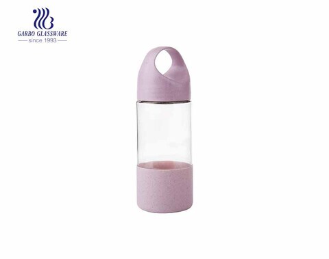 Wholesale cute design 380ml glass bottle with plastic sleeve and lid