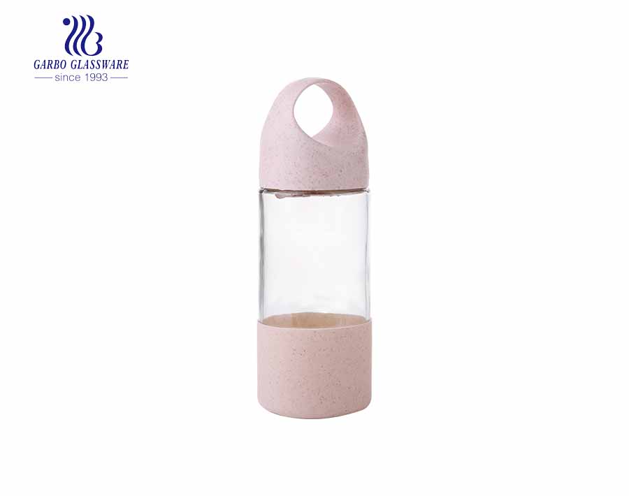 Wholesale cute design 380ml glass bottle with plastic sleeve and lid