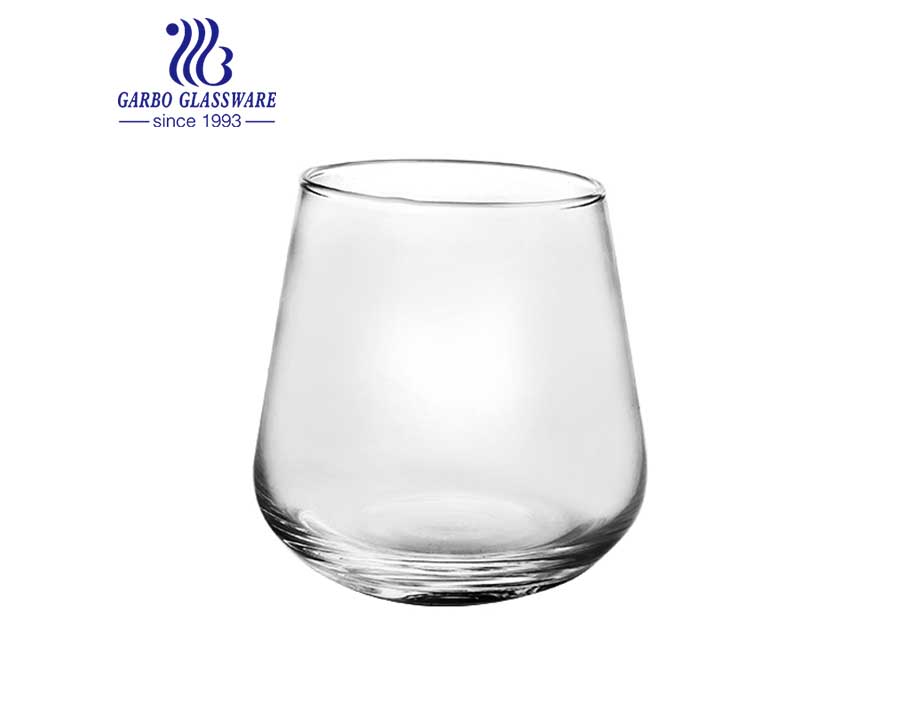 Vaso redondo de vidrio con forma de bola para jugos y bebidas en stock