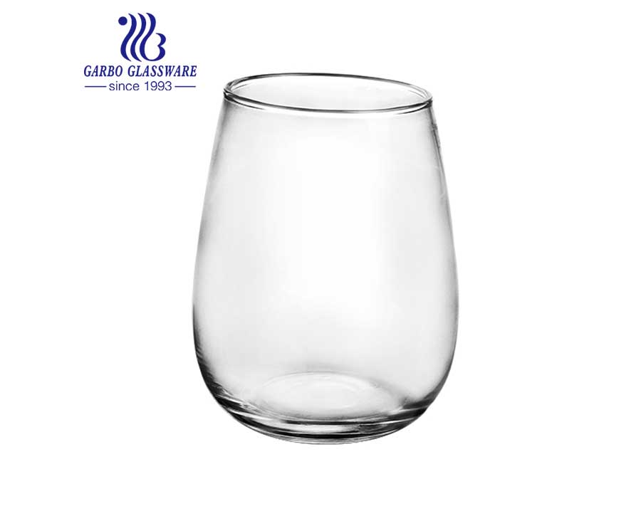 Ball shape round glass tumbler for juice and beverage in stock