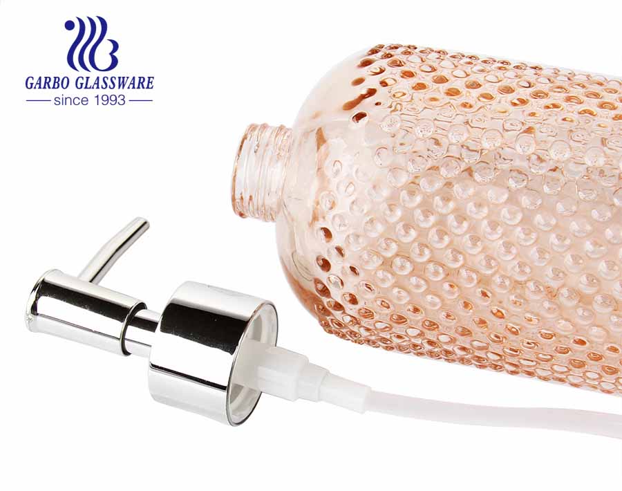 Dispensador de loción de vidrio de cal sodada transparente de alta calidad con espita de plástico 430ml