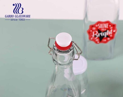 Glass bottle Shine like a bright star  19oz water bottel juice storage holder beer bottle with lock lid  