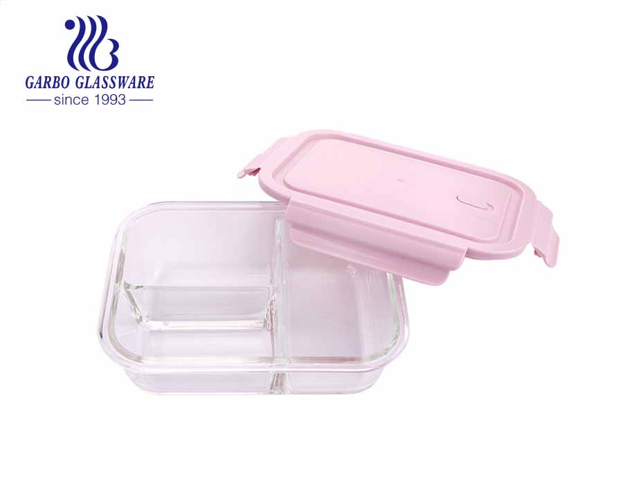 Rechteckige Lebensmittelbehälter aus Pyrex 1L-Glas mit innerem Teiler und rosa Verschlussdeckeln