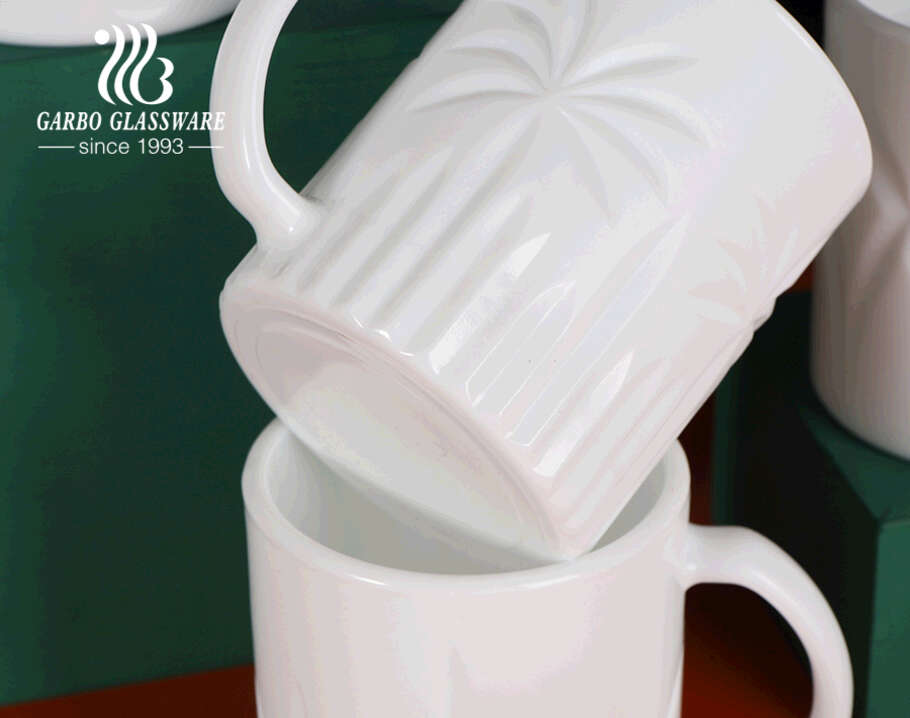 El nuevo diseño de garbo grabó tazas de té de vidrio opal 330ml tazas de café de ópalo transparente blanco