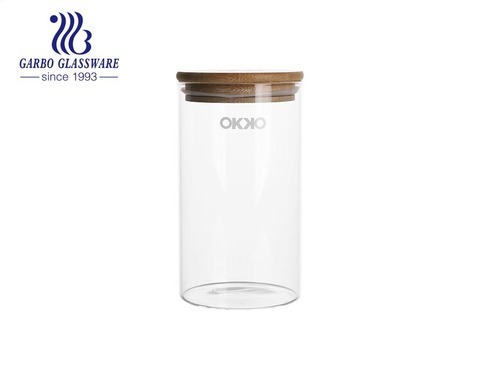 Vente en gros de bidons de cuisine empilables mis en bocaux en verre transparent pour la cuisine à la maison épaissir hermétiques bocaux de stockage des aliments 780 ml avec couvercle en bois