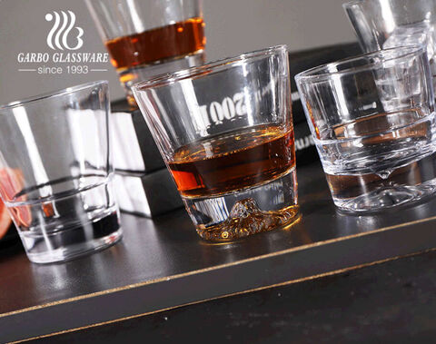 Premium glass tumbler with thickened base for whisky brandy spirit serving