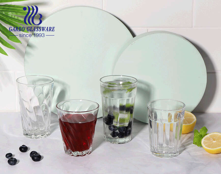 China glassware direct exporting glass drinking tumblers with twisting embossing