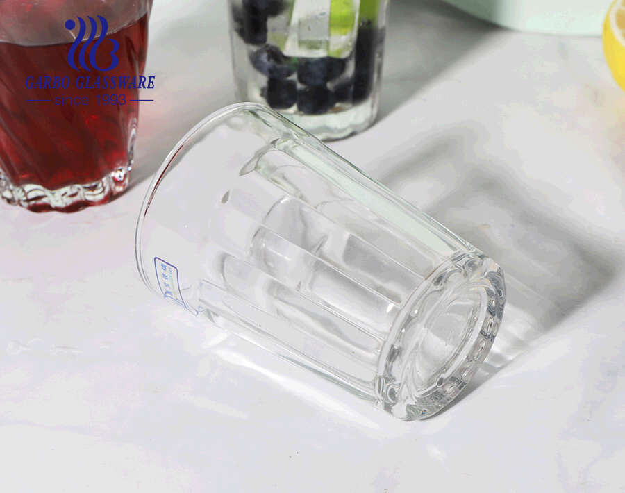 China glassware direct exporting glass drinking tumblers with twisting embossing