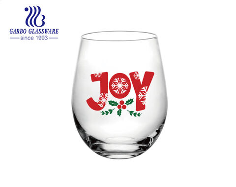 Exklusiver Glasbecher für das Weihnachtsfest mit dem Aufdruck von Weihnachtssternen