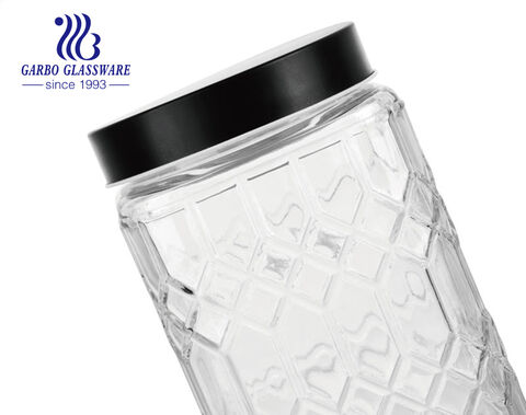 Wholesale cheap machine-made embossed round glass storage jar with engraved pattern with metal clip 