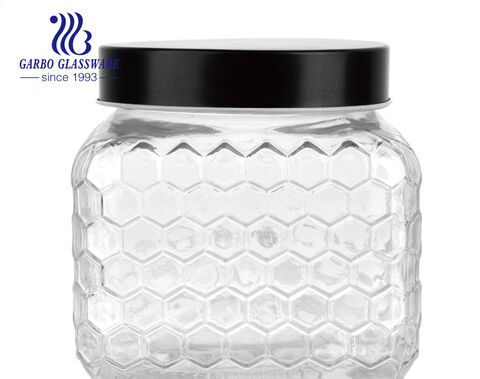 Wholesale cheap machine-made embossed round glass storage jar with engraved pattern with metal clip 