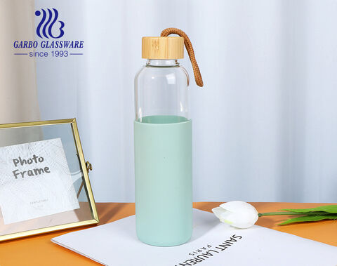 زجاجة ماء زجاجية من البورسليكات عالية السعة 600 مللي مع غطاء من القماش لحماية