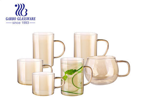 Tasses à café en verre à paroi simple résistantes à la chaleur de couleur or Tasse en verre de luxe avec poignée