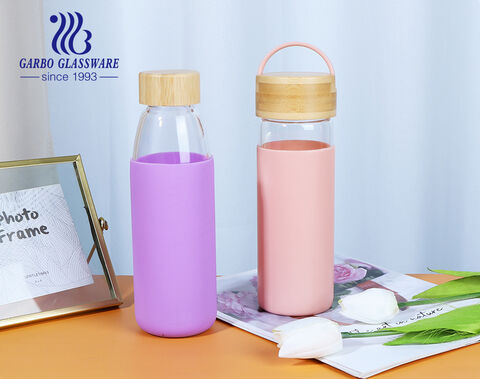 Botella de agua de vidrio resistente al calor de borosilicato con funda protectora