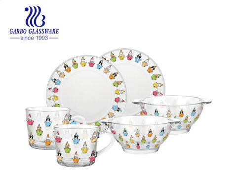The cartoon design of the glassware set with plate bowl and cups