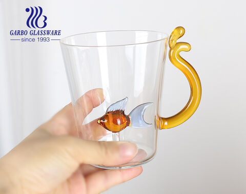 Customized single-wall high borosilicate glass mug with a plastic design inside