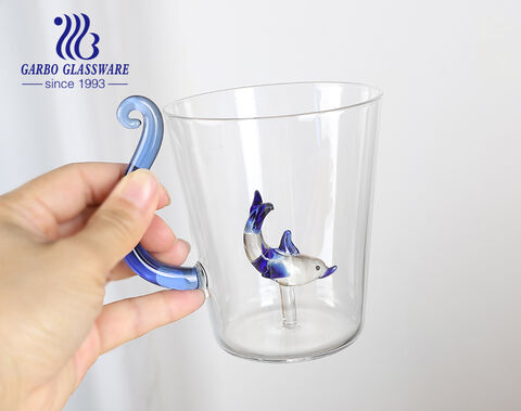 Customized single-wall high borosilicate glass mug with a plastic design inside