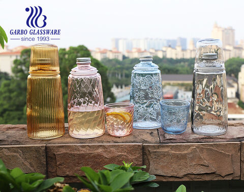 Bottiglia d'acqua in vetro spray colorato da 1100 ml con bicchiere tumbler
