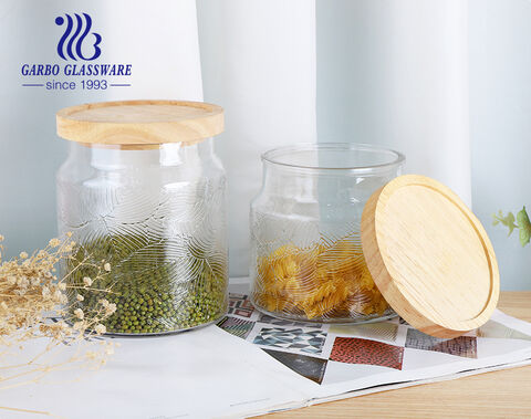 Pot de stockage en verre de modèle de gaufrage de feuille de bouteille en verre de couvercle en bambou de 1250 ml