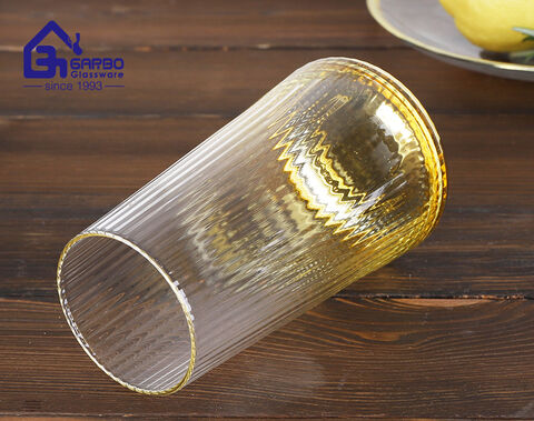 Luxury stemless wine glass golden base glass water tumbler