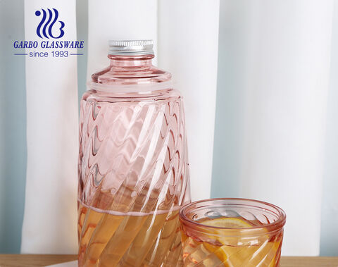 Bouteille d'eau en verre avec couvercles de tasse gravés en spray de couleur de 1100 ml