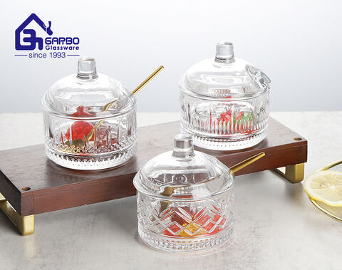 Jarra de vidro para doces por atacado com design gravado tigela de vidro com tampa