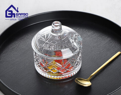 Tazón de vidrio grabado al por mayor del tarro del caramelo de cristal del diseño con la tapa