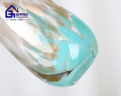 Proveedor mayorista de China, vaso de cristal con forma de huevo de 560ml con color