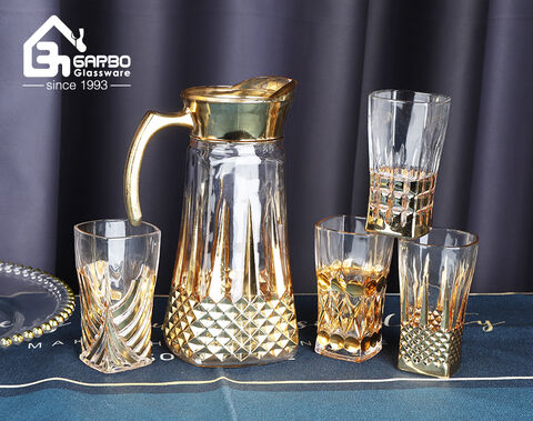 Machine-made high white quality Africa style 7pcs glass pitcher jug set with golden plating design