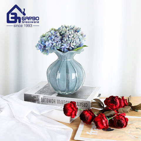 Elegante florero de vidrio de color sólido con forma irregular para el mercado europeo