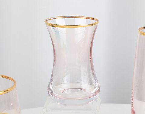 Luxury stemless wine glass series with gold rim and pink color spray