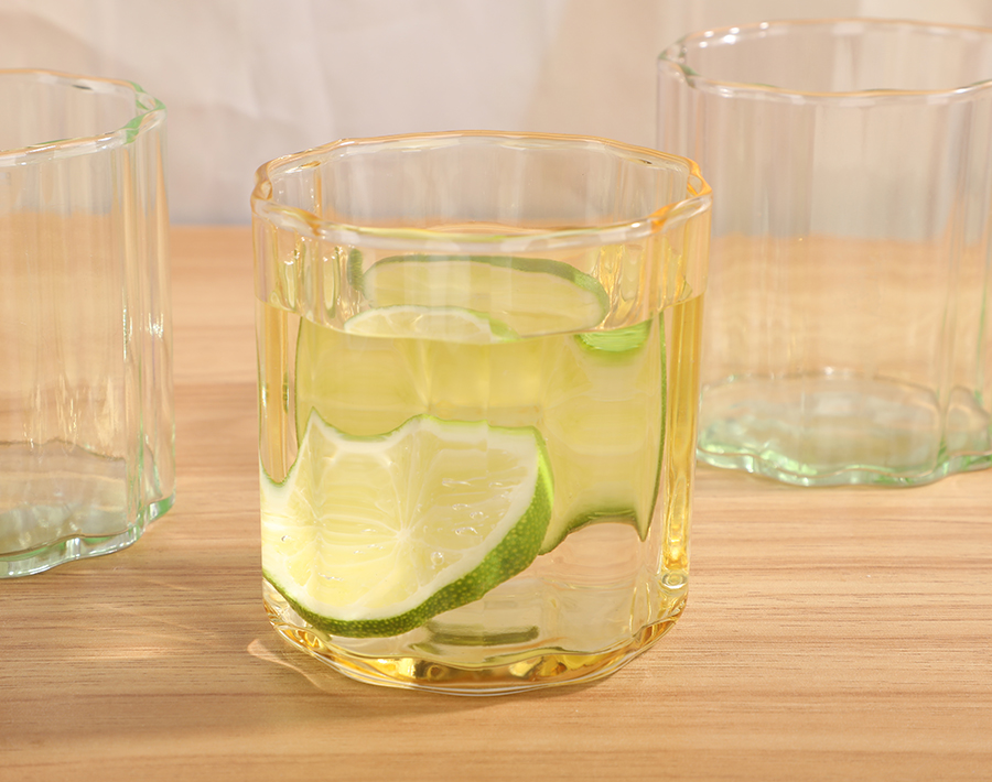 295ML flower shape machine blown glass tumbler with spray color