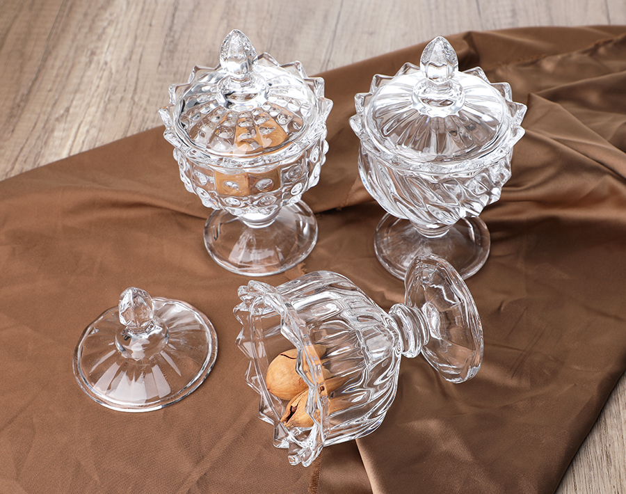 Machine-made high-white footed glass candy peanut jar with lid and foot