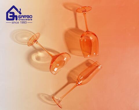 Machine-blown spraying orange colored drinking glass stemware for bar use online gift shop