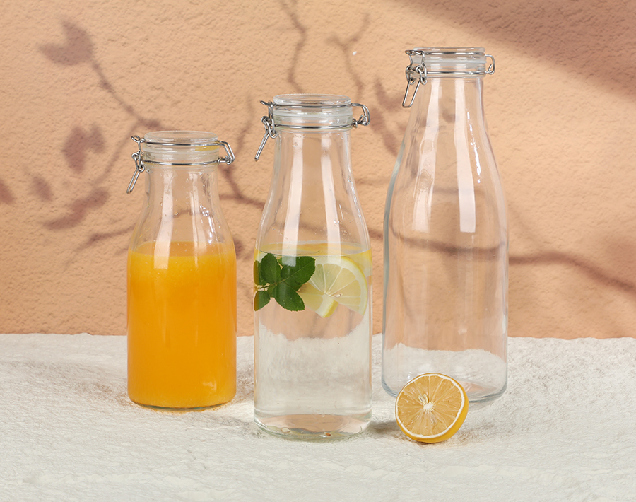 Wholesale glass water bottle with buckle lid for milk and juice